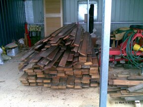 Recycled hardwood floor joists and tongue-and-groove flooring