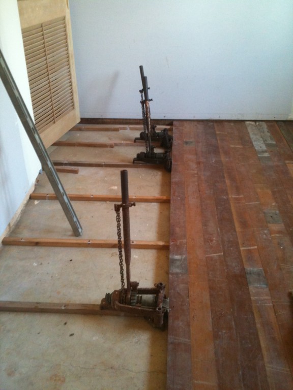 Yesteryear's floor board tensioner in use Yesteryear's tools in use